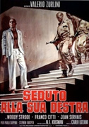 Seduto alla sua destra
